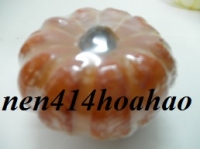 Nến bí ngô ɸ 6 cm cao 4,5 cm: 26.000 đ/cái, ɸ 9 cm cao 8 cm: 55.000 đ/cái