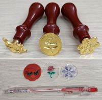 Con dấu (tay cầm nhựa) uyên ương, hoa hồng oval, bông tuyết: 30.000 đ/cái